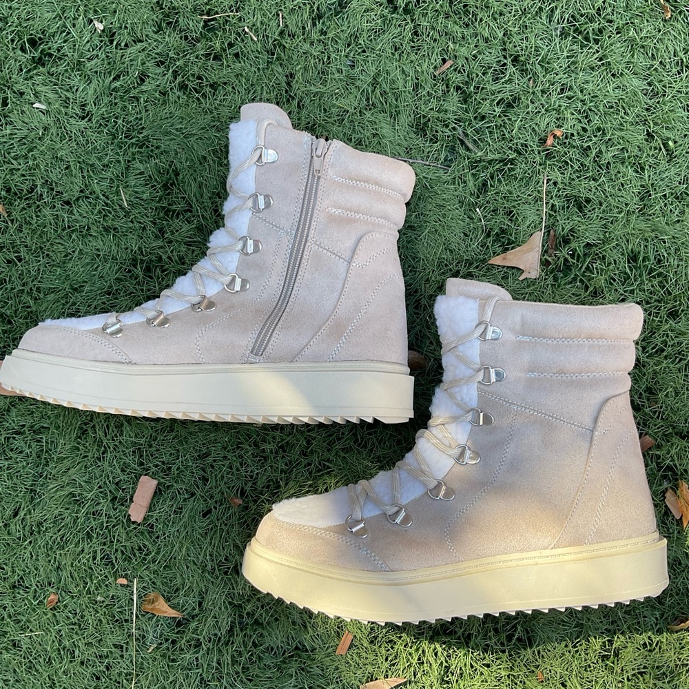Taupe lace up boot cream fluffy fabric tongue. Inside zipper easy on/off
